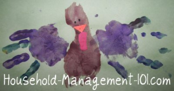 Footprint and handprint turkey craft project idea for kids {courtesy of Household Management 101} #KidsCraft #ThanksgivingCraft #HandprintCraft