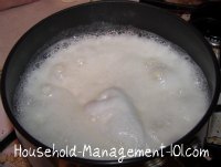 milk and sugar boiling to make fudge