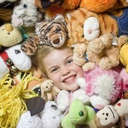 buried in stuffed animals